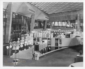 Photograph of the entrance to the Library 21 exhibit, showing the bridge into the first circle.