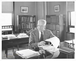 ALA Secretary Carl Milam at his desk at the ALA Headquarters.