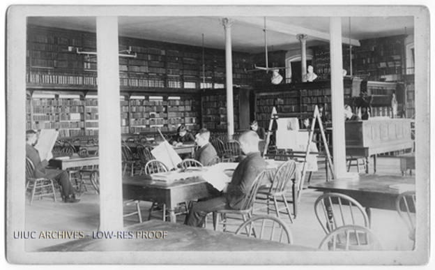 Interior of university hall library with students studying