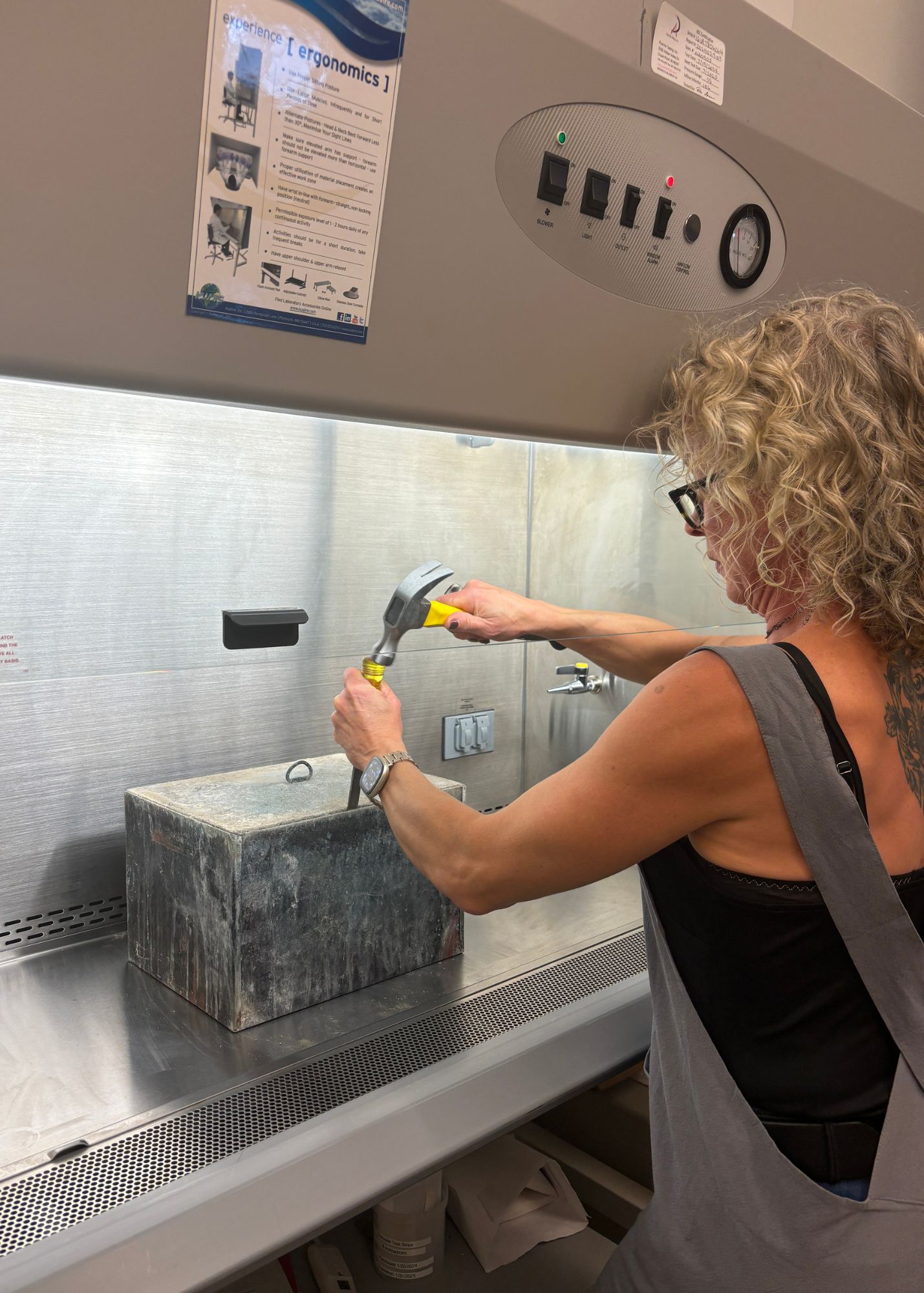 Preservation staff member opening 1924 time capsule