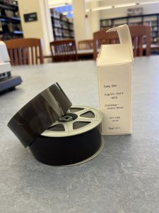 Image of microfilm reel of the 1978 Daily Illini and accompanying box