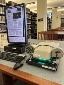 Image of microfilm scanner and screen showing an image of the Daily Illini from 1978.